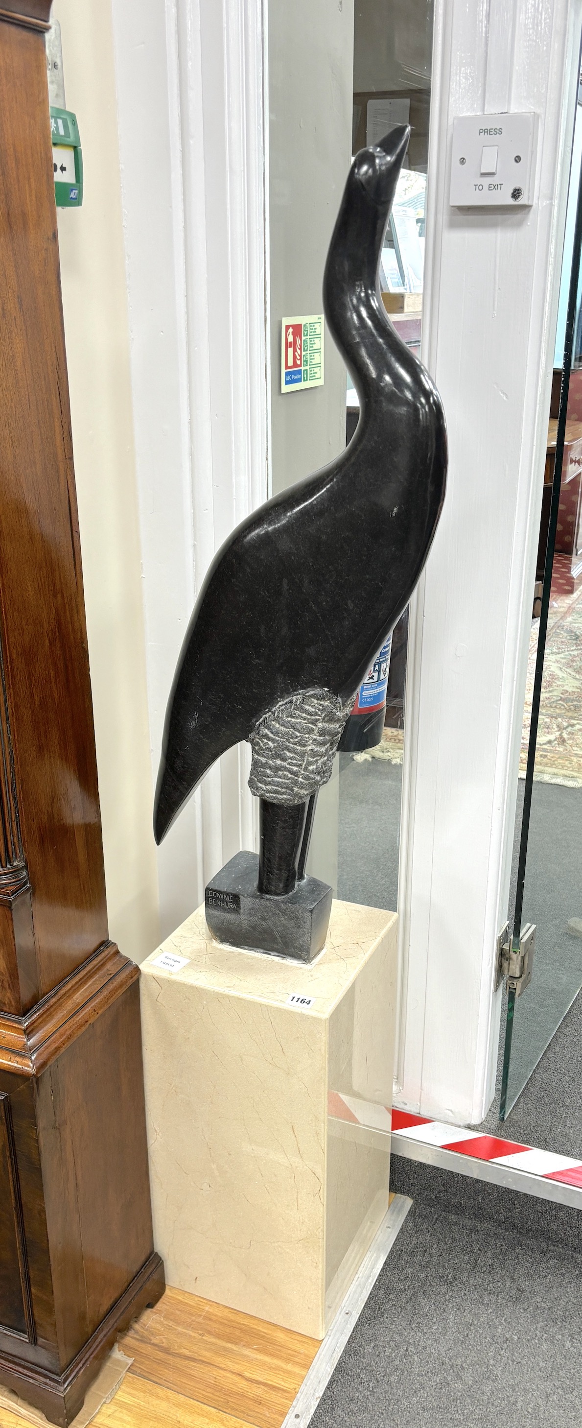 Dominic Benhura (Shona,b.1968), a springstone sculpture of an egret, with stand, height 142cm